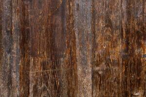 Old wood texture background, surface with old natural colored wood, top view. Grain table surface. photo