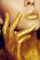 Magic Girl Portrait in Gold. Golden Makeup photo