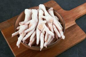 Raw chicken feet photo