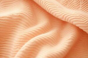 AI generated soft knitted sweater fabric in color of the year 2024 peach fuzz photo