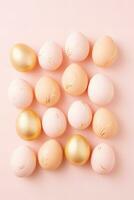 AI generated Easter eggs flat lay in handpainted decorated peach fuzz and gold colors on a pastel peach background photo