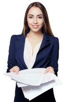 Young woman hold pages of paper. Paperworker photo