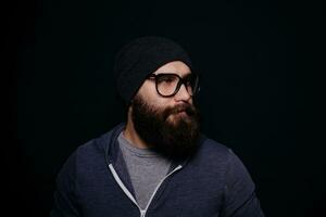 hermoso masculino grande barba en lentes y sombrero foto