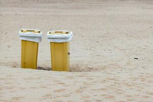 garbage bin in the beach photo