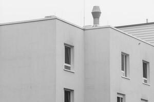 Detail of a high-rise building with windows from the 70s photo