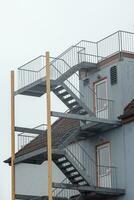 staircase at the building in the sun photo