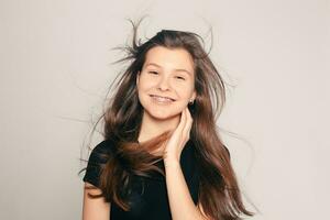 Portrait of teen girl showing dental braces. photo