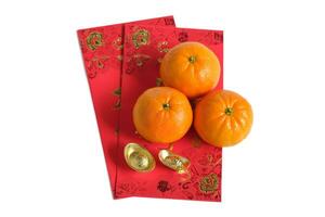 Happy New Year Chinese year of dragon 2024. Mandarin orange and gold ingots on red envelopes isolated on white background. photo