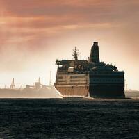 Big cruise liner. Passenger ferry ship entering Riga at morning photo