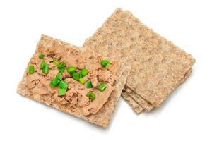 Crispy Sandwich with Chicken Pate and Green Onions Isolated on White Background Top View. Whole Grain Bread with Liver Pate. Diet Breakfast and Healthy Food photo