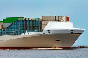 Grey container ship. Logistics and production import photo