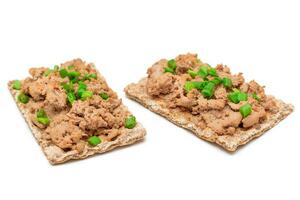 Crispy Sandwich with Chicken Pate and Green Onions Isolated on White Background Top View. Whole Grain Bread with Liver Pate. Diet Breakfast and Healthy Food photo