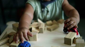 Portrait of boy playing a blocks wood game. selective focus. Copy space. Executive Functions Concept. video