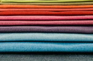 a stack of colorful fabric photo