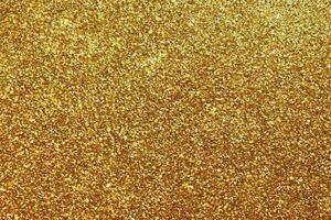 Abstract gold glitter sparkle background photo