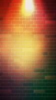 The red brick wall vertical format background template has a bright lamp light in the center. Vector illustration EPS10.