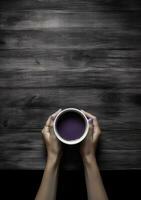 AI generated female hands holding a cup of coffee, photo
