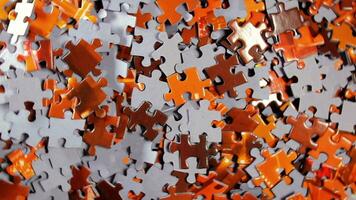 Background of Colored Puzzle Pieces that Rotating Clockwise Top View. Texture of Incomplete Red and Grey Jigsaw Puzzle Right Rotation video