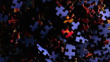 Background of Colored Puzzle Pieces that Slowly Rotating Clockwise Top View. Texture of Incomplete Red and Blue Jigsaw Puzzle with Low Key Light Right Rotation video