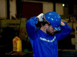 labour man male person blue uniform factory safety danger blue collar worker builder construction industry technology development occupation work job product copy space manufacturing factory protect photo