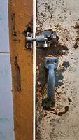 rusty iron door lock photo