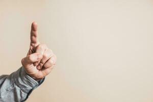 Close up image of male hand pointing. photo