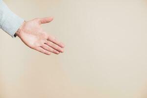 Close up image of open male hand showing something. photo