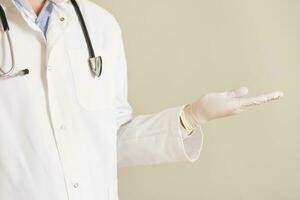 Image of male doctor gesturing. photo