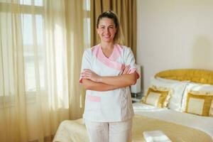 Portrait of beautiful hotel maid. photo