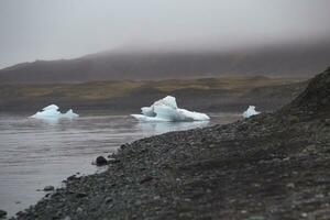 The Diamond Beach in Iceland.Image contains little noise because of high ISO set on camera. photo