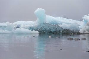 The Diamond Beach in Iceland.Image contains little noise because of high ISO set on camera. photo