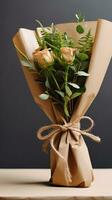 AI generated A bouquet of flowers wrapped in brown paper and tied with twine, a simple yet elegant way photo