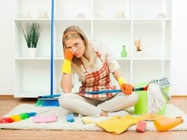 Angry housewife cleaning photo