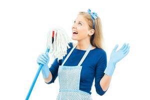 Cheerful housewife and singing photo