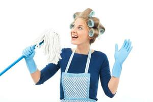 Cheerful housewife and singing photo