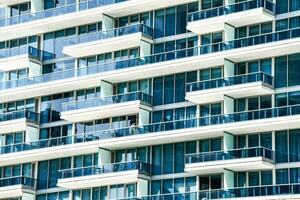 modern apartment building with blue balconies photo