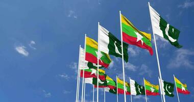 Pakistan and Myanmar, Burma Flags Waving Together in the Sky, Seamless Loop in Wind, Space on Left Side for Design or Information, 3D Rendering video