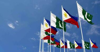 Pakistan and Philippines Flags Waving Together in the Sky, Seamless Loop in Wind, Space on Left Side for Design or Information, 3D Rendering video