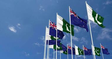 Paquistão e Novo zelândia bandeiras acenando juntos dentro a céu, desatado ciclo dentro vento, espaço em esquerda lado para Projeto ou Informação, 3d Renderização video