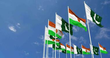 Pakistan and Niger Flags Waving Together in the Sky, Seamless Loop in Wind, Space on Left Side for Design or Information, 3D Rendering video