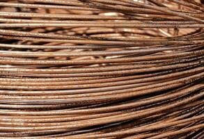 a close up of a pile of copper wire photo