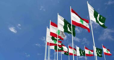 Pakistan and Lebanon Flags Waving Together in the Sky, Seamless Loop in Wind, Space on Left Side for Design or Information, 3D Rendering video