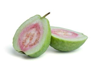 Organic guava fruit with stems and leaves, bright green skin, pink guava flesh, with leaves isolated on white background. photo