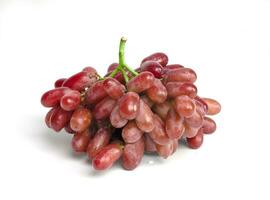 Grapes. A big bunch of bright red grapes, bunch of grapes on a green stalk, isolated on white background with clipping path. photo