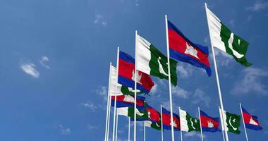 Pakistan and Cambodia Flags Waving Together in the Sky, Seamless Loop in Wind, Space on Left Side for Design or Information, 3D Rendering video