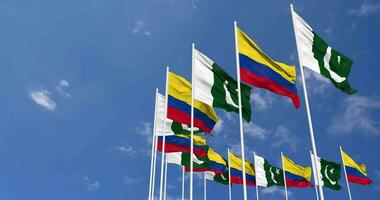 Pakistan and Colombia Flags Waving Together in the Sky, Seamless Loop in Wind, Space on Left Side for Design or Information, 3D Rendering video