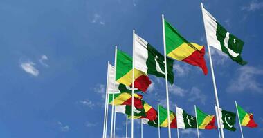 Pakistan and Congo Flags Waving Together in the Sky, Seamless Loop in Wind, Space on Left Side for Design or Information, 3D Rendering video