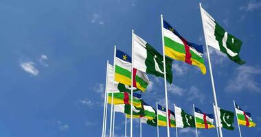 Pakistan and Central African Republic Flags Waving Together in the Sky, Seamless Loop in Wind, Space on Left Side for Design or Information, 3D Rendering video