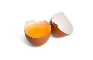 fresh organic chicken eggs and half-broken egg with yolk isolated on white background photo