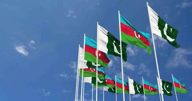 Pakistan and Azerbaijan Flags Waving Together in the Sky, Seamless Loop in Wind, Space on Left Side for Design or Information, 3D Rendering video